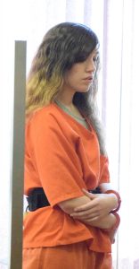 Ashlee Martinson enters Oneida County Circuit Court Branch II for a restitution hearing Wednesday related to her conviction on two counts of second-degree intentional homicde for the deaths of Thomas and Jennifer Ayers, her step-father and mother.