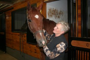 Kathy Kopp, with her Oldenburg horse, Owen. The two have been together approximately nine years and were recently notified they own three national 2017 dressage titles.