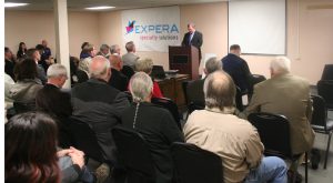 Rhinelander mill manager Jeff Verdoorn addresses the audience at Tuesday's ceremony at the new Expera Coated Products building on Kemp Street.