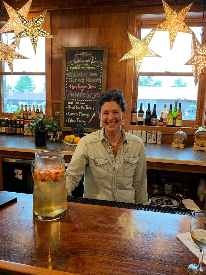 Karissa, owner of Earthgoods is ready to serve homemade Sangria.