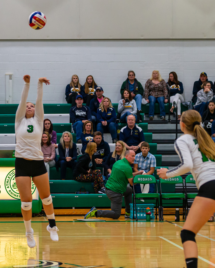 Olivia TerBeest sets up teammate Kahlie Arneson for the point.
