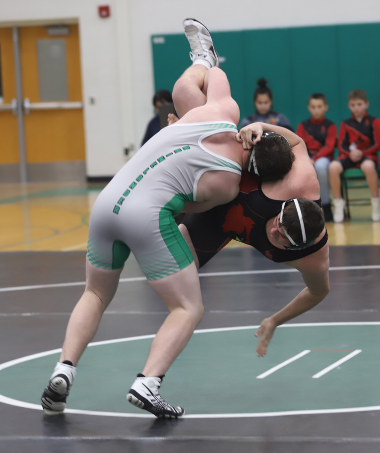 Trevor Knapp wrestled at 285 and picked up Nick Adamski and put him to the mat.
