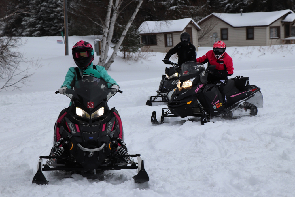 This group of snowmobilers makes a stop at Slo's Pub in Arbor Vitae.