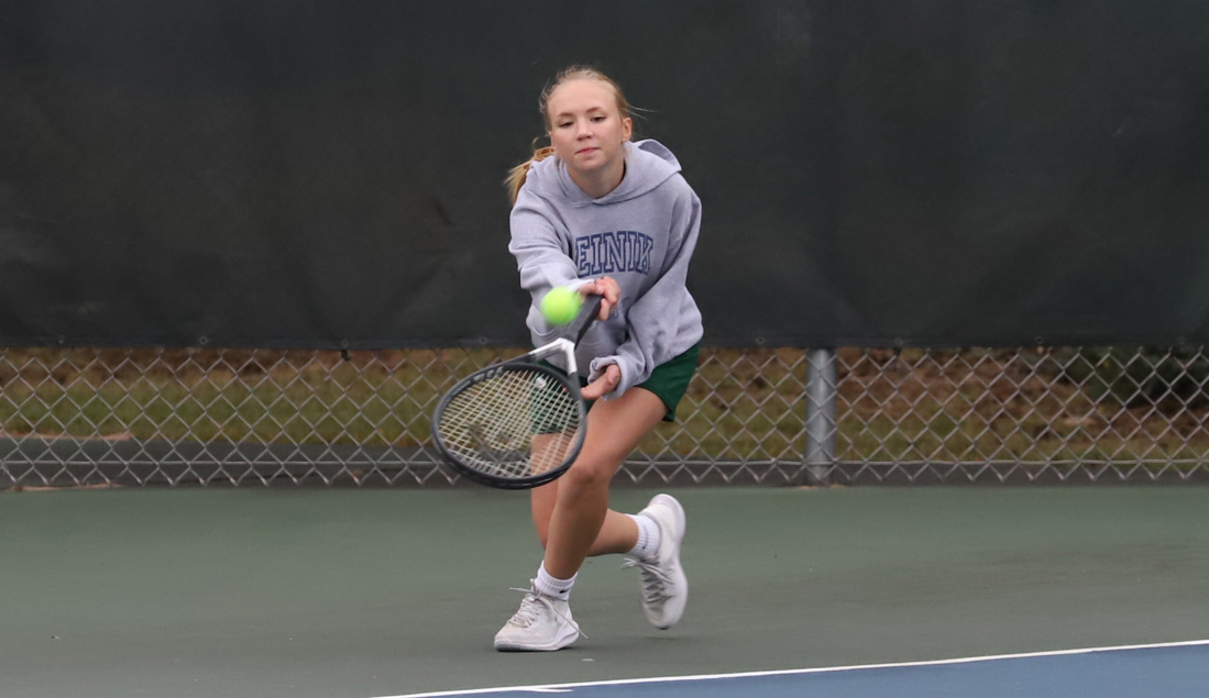 At No. 3 doubles, Paige Oleinik gets to the ball for a return volley.
