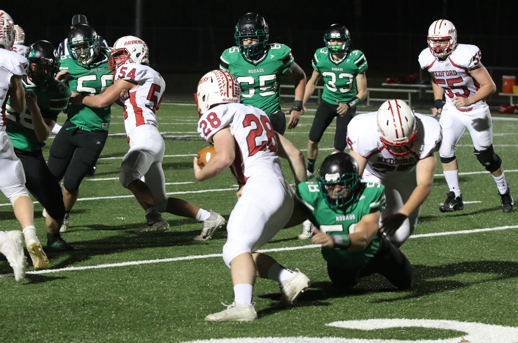 Senior Ben Sinclair makes a tackle for loss in the first quarter.