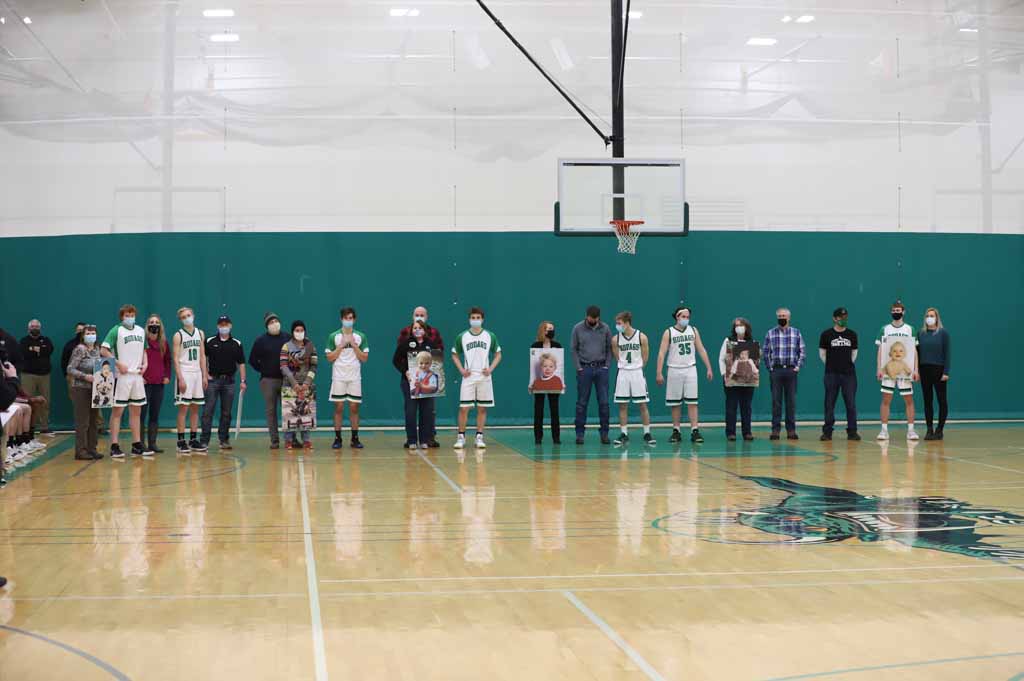 The seniors and parents were recognized before the game Thursday night.