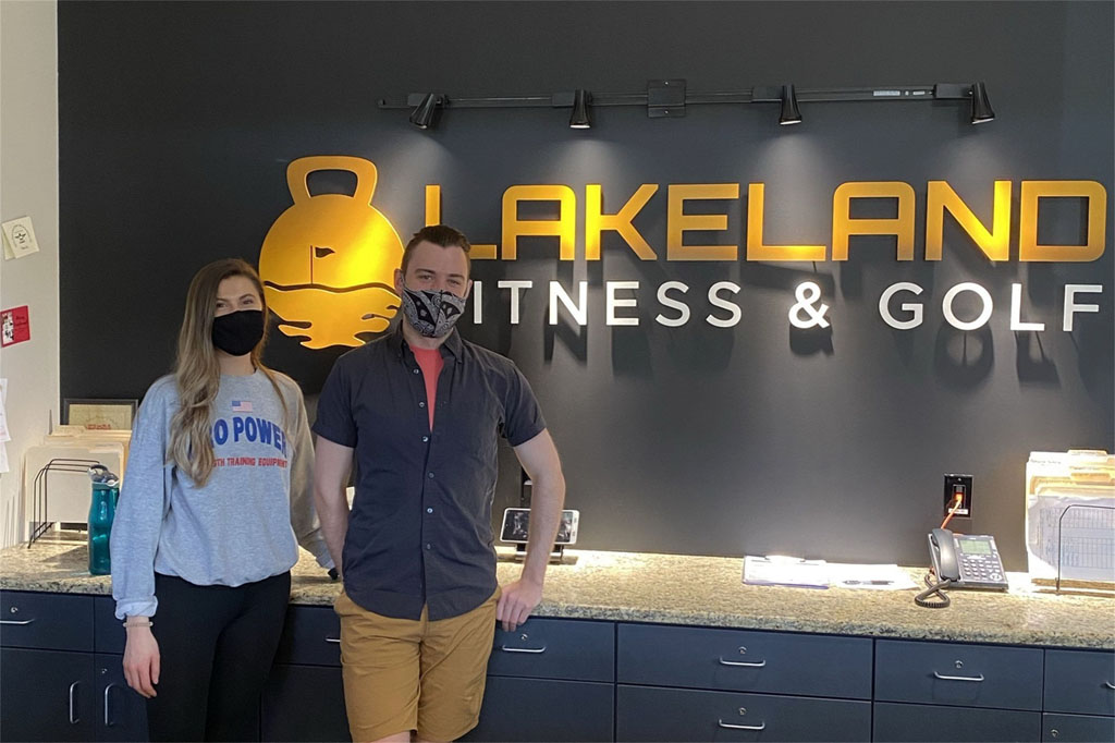 Hollie and Robert welcome members to Lakeland Fitness and Golf in Woodruff.