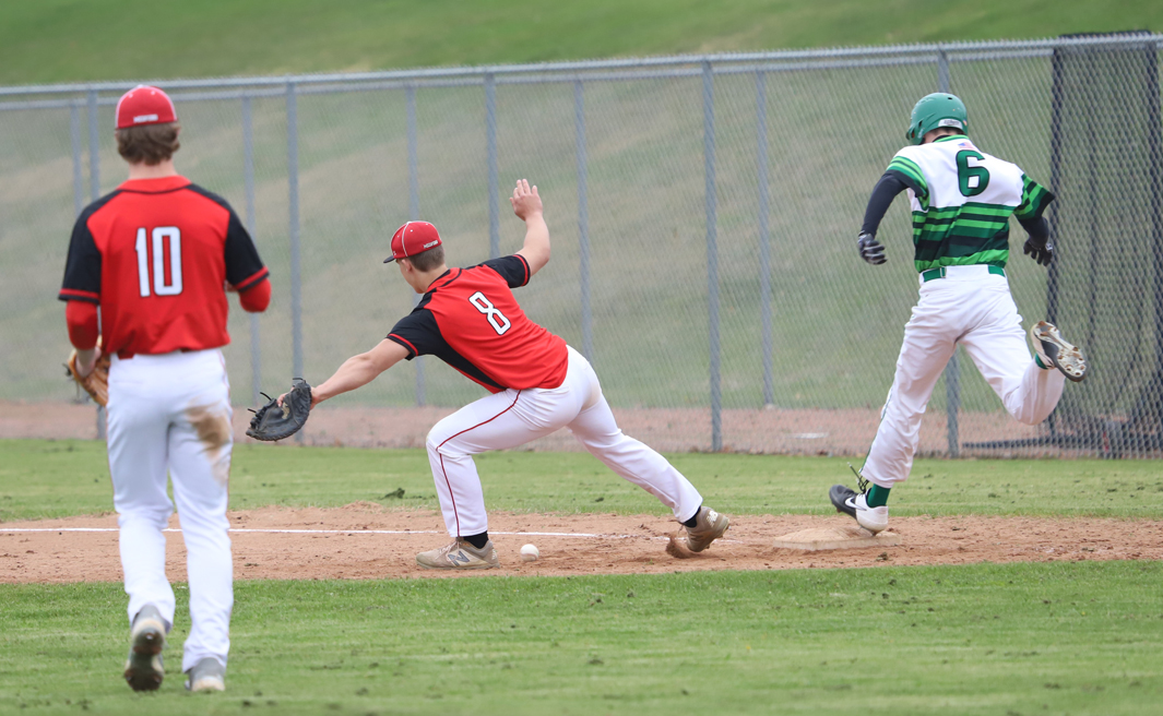 Ryan Jamison was safe as the first baseman was unable to secure the catch.