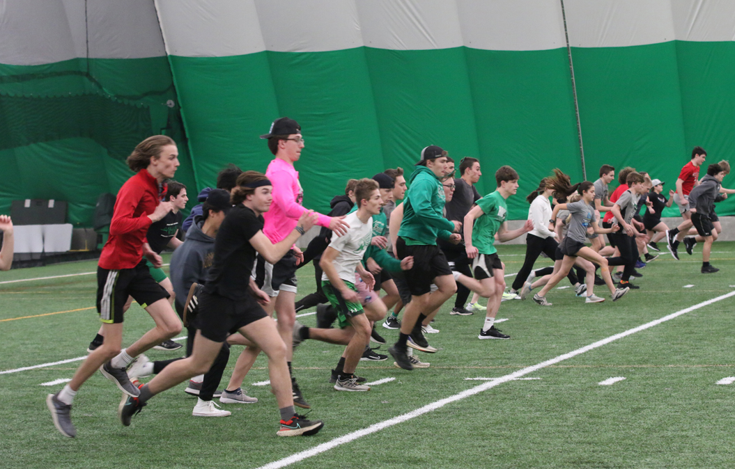 Track participants began with some form running and agility training.