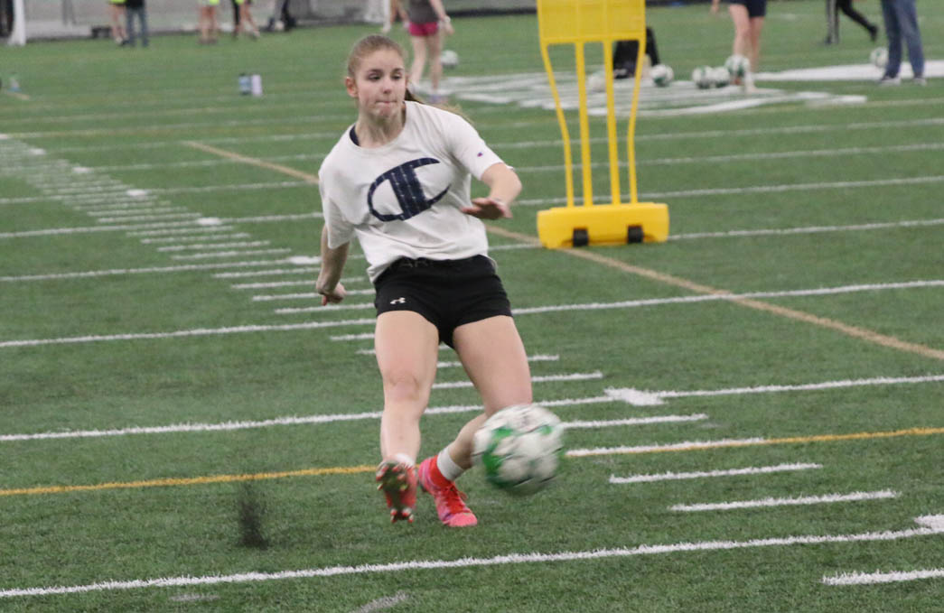 Senior Makenna Brown takes a shot on goal during the first practice Monday.